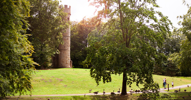 family walking through Hardwick Park in the Vale of Durham